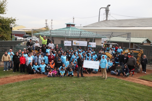 Jenkins Insurance Presenting the Check to TLC